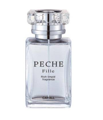 Carall Peche Fille perfume bottle with white musk scent, featuring elegant packaging and a sleek design.