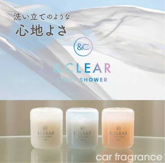 Diax Clear Light Shower and Clear Gel, transparent skincare products in clear containers, displayed in a natural setting