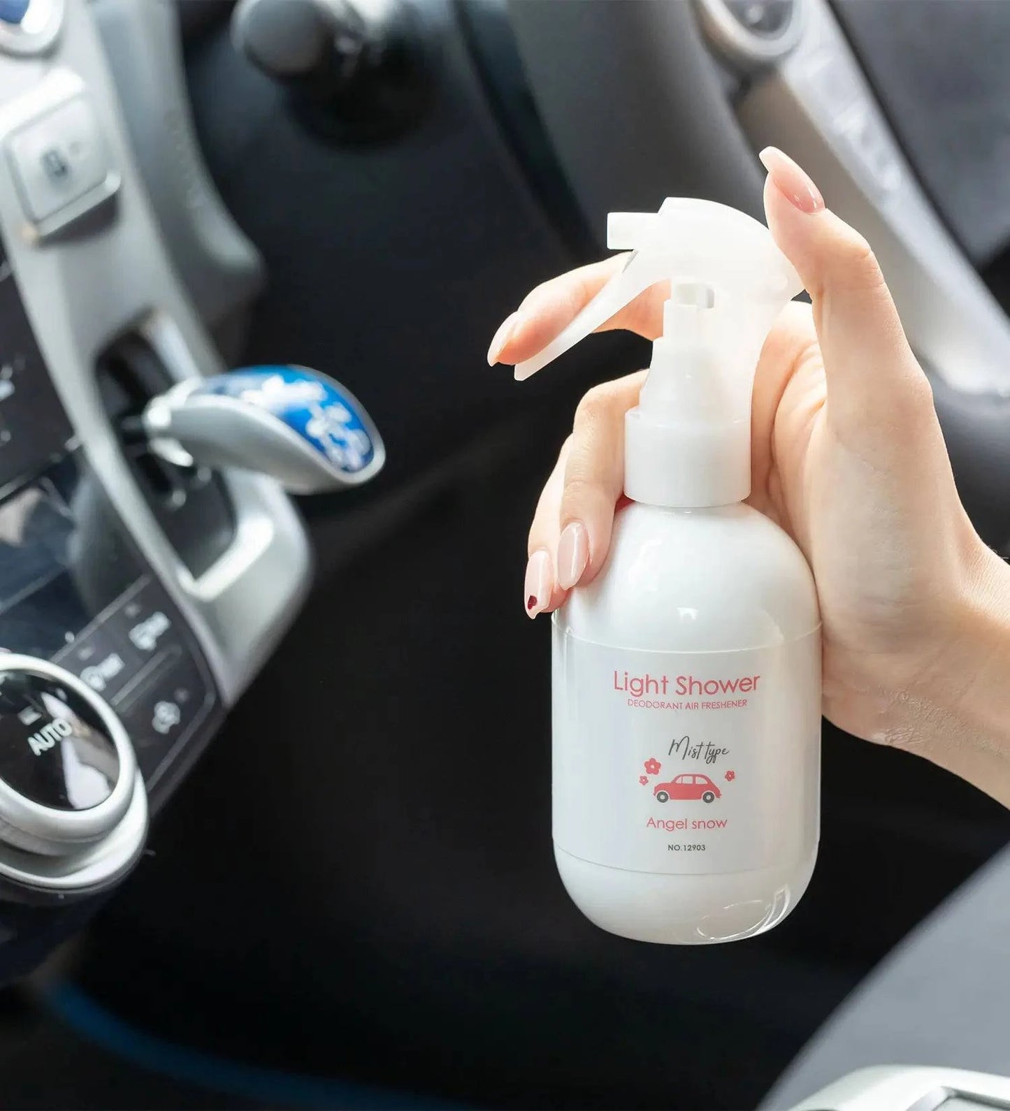Diax Light Shower Mist Type 2, a compact spray bottle with a sleek design for refreshing mist application.