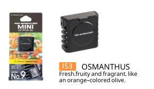 Air Spencer MINI No. 9 Osmanthus vent air freshener attached to car vent, compact and stylish fragrance diffuser for vehicle interior.