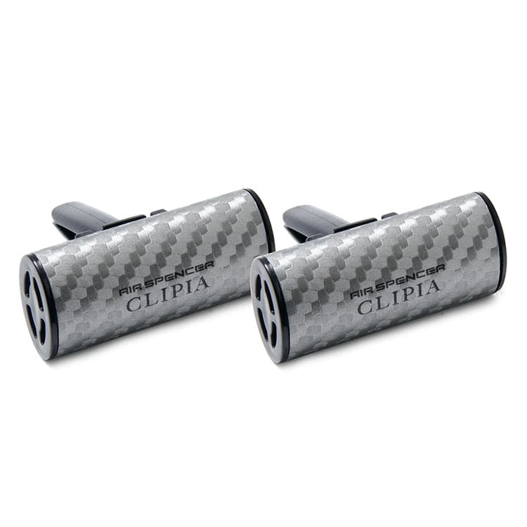 Air Spencer Giga Clippia II Carbon Fiber vent air freshener clipped to a car vent, sleek black design, enhances interior scent.