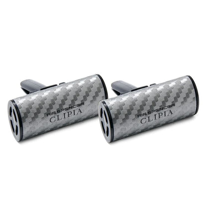 Air Spencer Giga Clippia II Carbon Fiber vent air freshener clipped to a car vent, sleek black design, enhances interior scent.