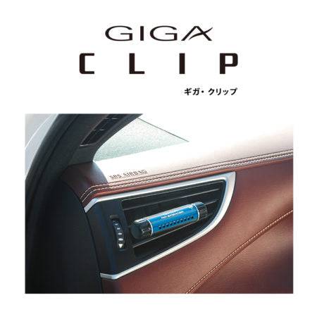 Air Spencer Giga Clip vent air freshener attached to car vent, featuring a squash-shaped design and vibrant colors.